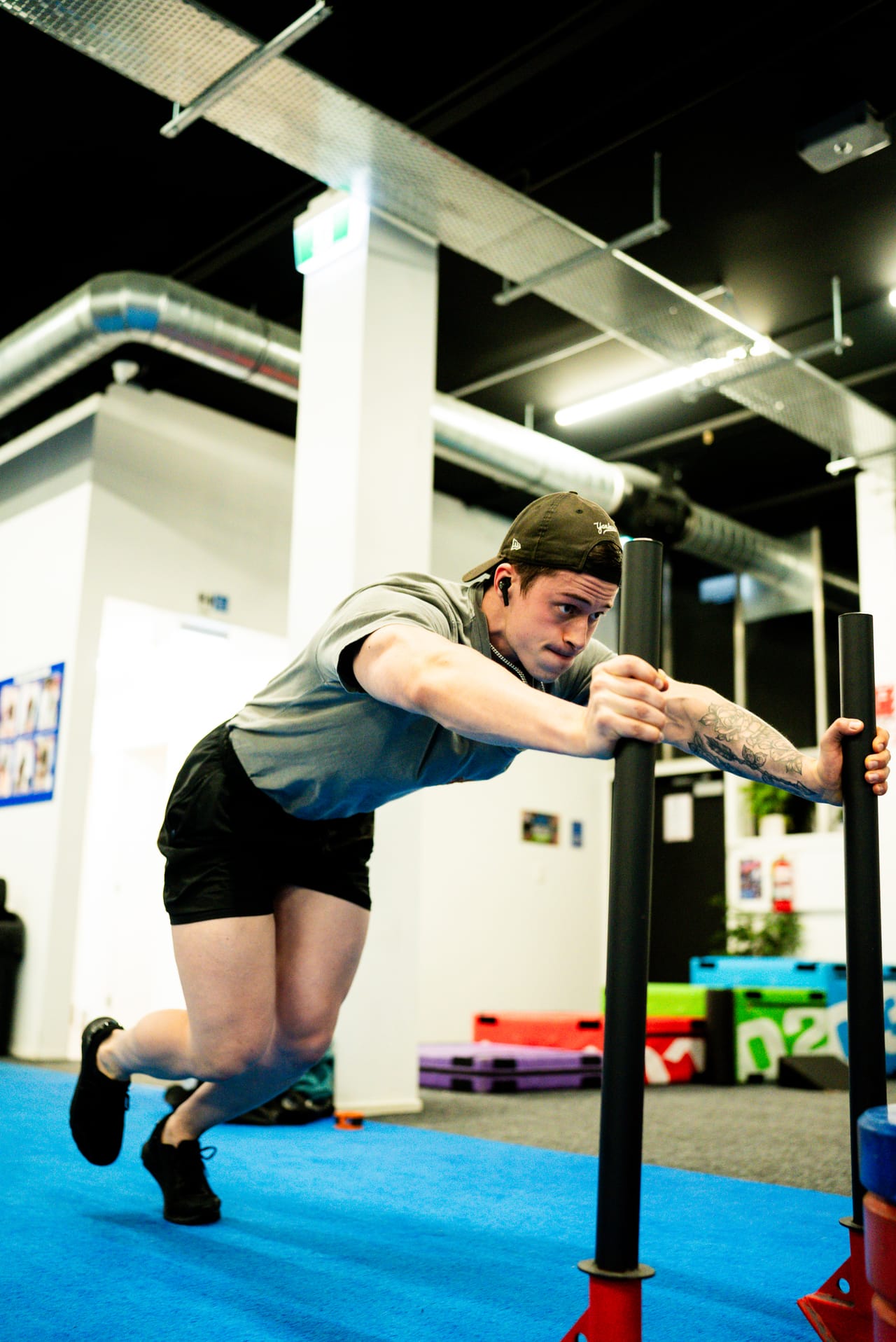 A Hoop33 member locked in and focused during a strength session